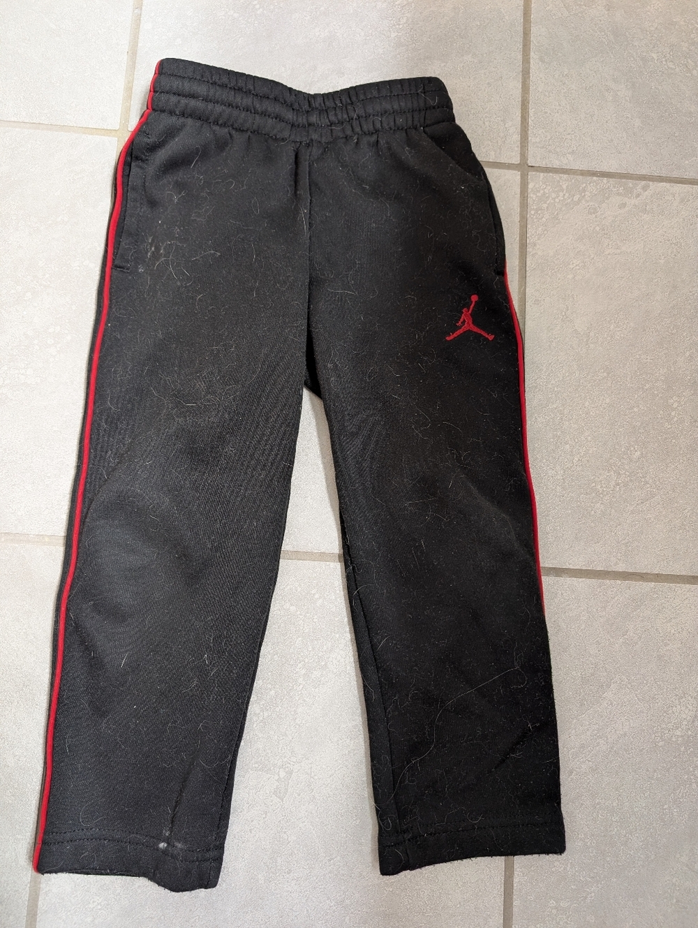 Nike Jordan Therma Fit Black Sweatpants with Red Trim and Jumpman, Size 4